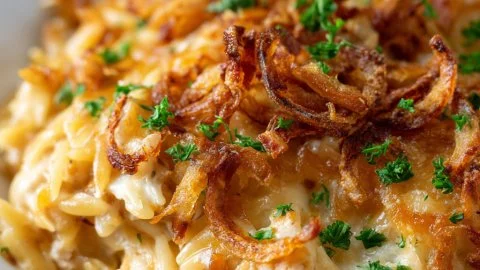 Delicious French Onion Chicken Orzo Casserole served in a baking dish