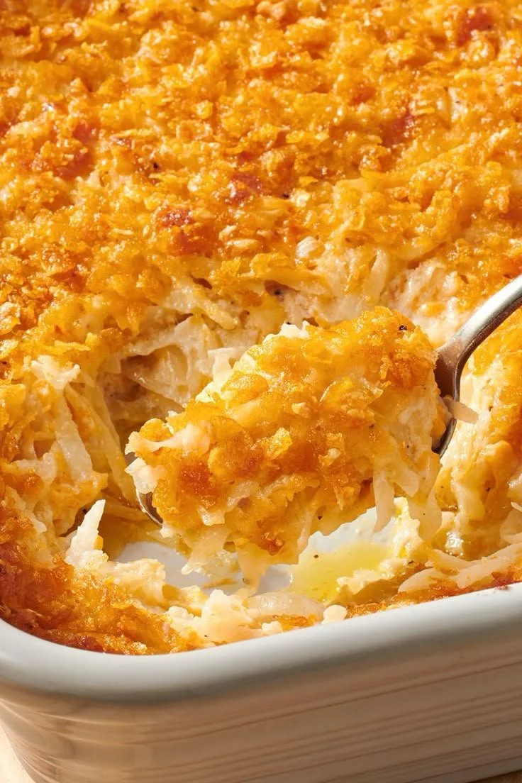 Delicious Grandma's Hash Brown Casserole baked to perfection with cheese and crispy edges.