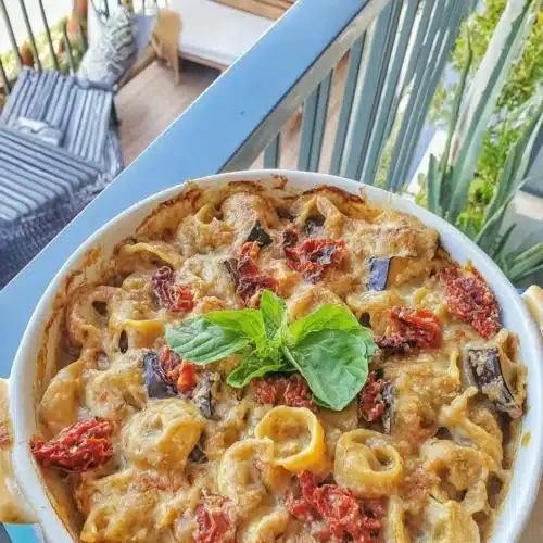 Sicilian Aubergine and Sun-Dried Tomato Pasta Bake in a ceramic dish