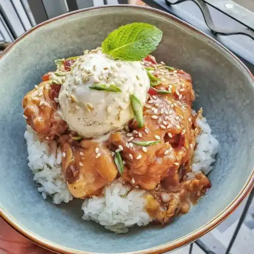 Delicious teriyaki chicken casserole with sticky rice and sesame seeds