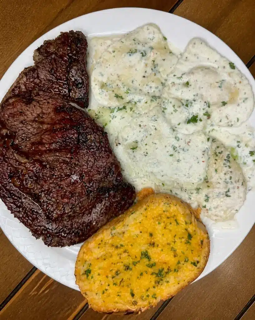 Lobster raviolis for dinner with a smoked ribeye and cheesy garlic toast