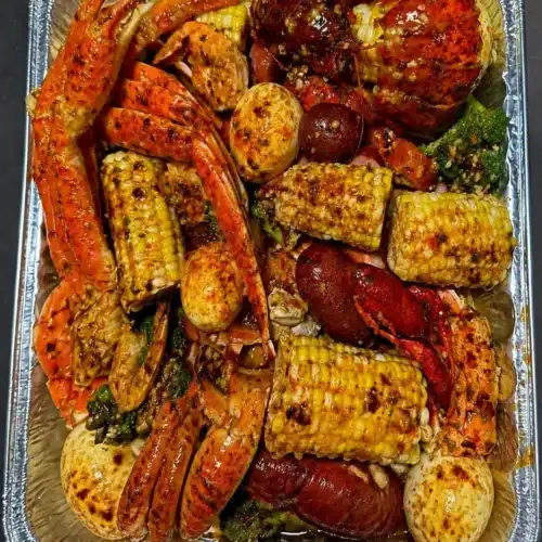 Delicious seafood boil with crab, lobster, shrimp, and crawfish served in a festive setting